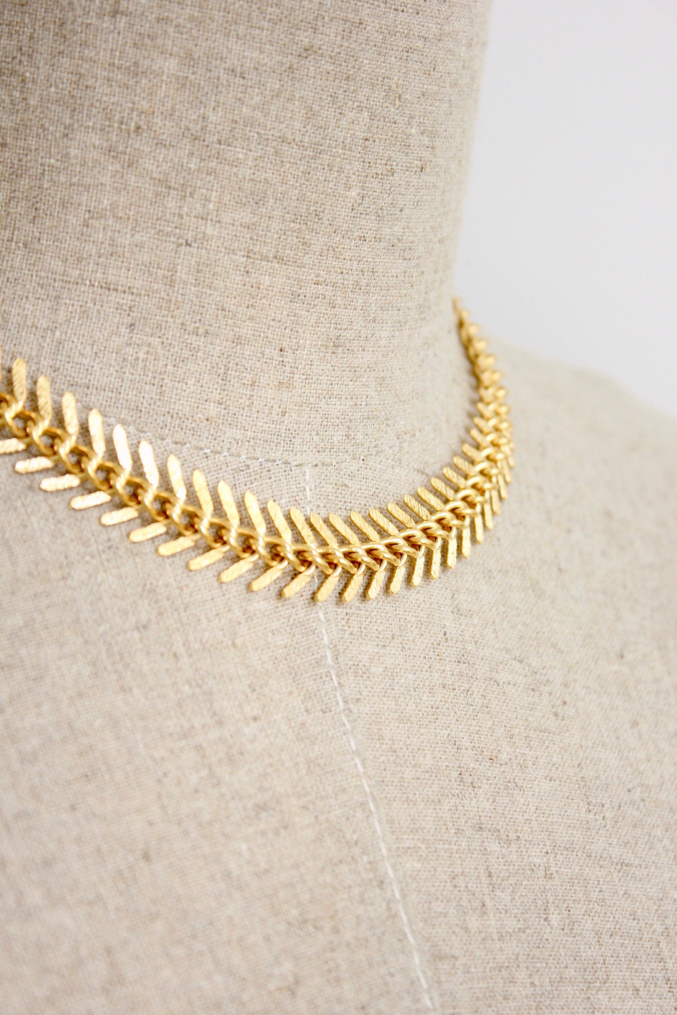 DOR215 18k matte gold fish bone necklace