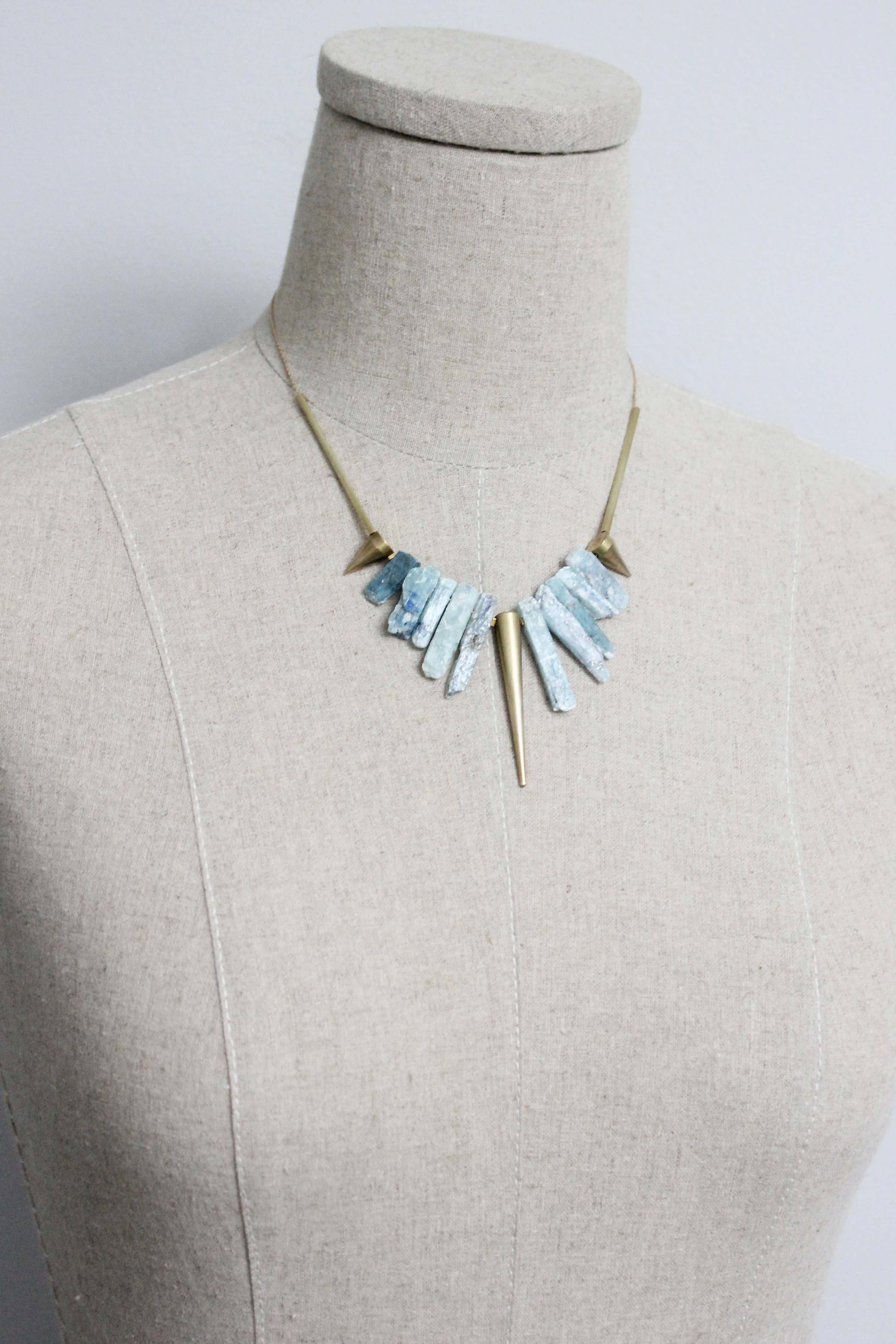 Kyanite and brass geometric necklace