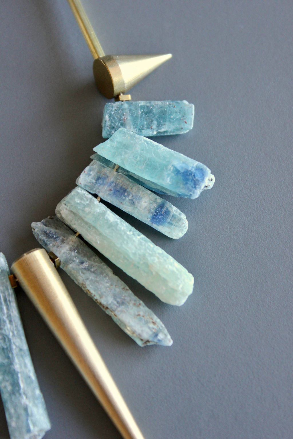 Kyanite and brass geometric necklace